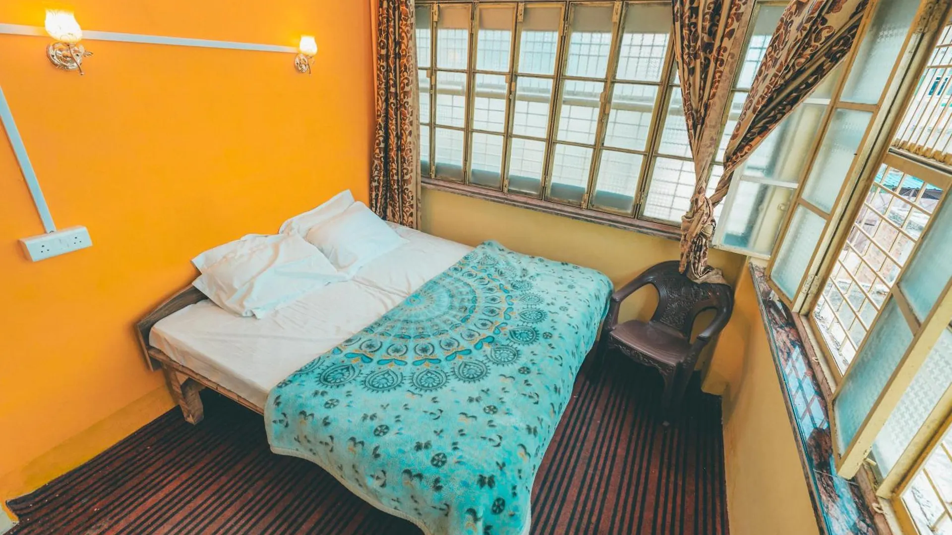 בית הארחה Om Rest House D24 32A, Pandey Ghat, Bengali Tola, Varanasi, Utter Pradesh הודו